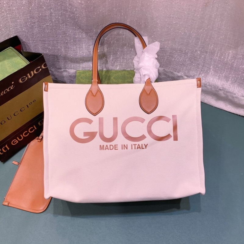G*u*i shopping bags